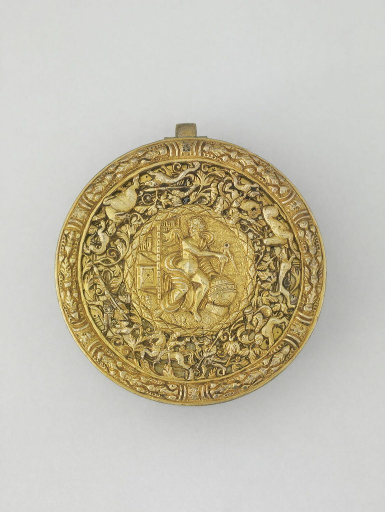 Montre de forme tambour, acier et laiton, boîtier en partie ajouré, moulé et ciselé, Allemagne vers 1550